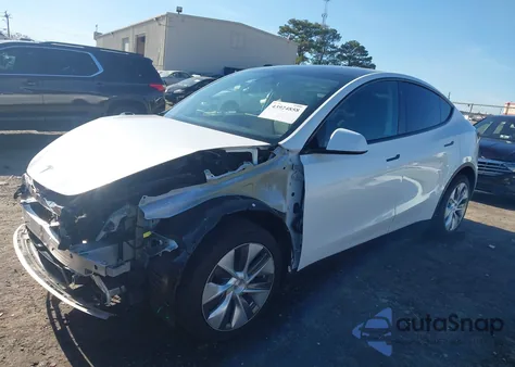 2023 Tesla Model Y Awd/Long Range Dual Motor All-Wheel Drive z USA, uszkodzony, nr VIN 7SAYGDEE5PA064167